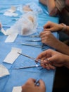 View on table with blue cover and surgical instruments during surgical suturing course Royalty Free Stock Photo