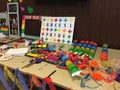 View of table full of craft supplies for celebrating Pride Month in George Brown College ESL campus