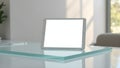 A tablet displaying a presentation placed on a modern glass desk Royalty Free Stock Photo