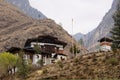 View of Tachog Lhakhang Dzong fortified monastery at the foot of the Phurdo mountains, Bhutan - Feb 2017