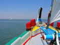 View from the Tagus river estuary from the prow or bow of the sailboat Amoroso, a historical, typical or traditional Varino type Royalty Free Stock Photo