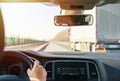 View taken from inside a vehicle overtaking a large vehicle on the highway Royalty Free Stock Photo