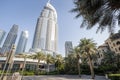 View on tall houses and palm trees in Dubai city center from park near by, Dubai, United Arab Emirates Royalty Free Stock Photo