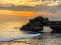 View of Tanah Lot, traditional balinese temple at sunset