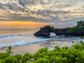 View of Tanah Lot, traditional balinese temple at sunset