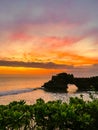 View of Tanah Lot, traditional balinese temple at sunset