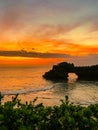 View of Tanah Lot, traditional balinese temple at sunset