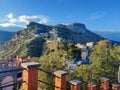 View from Taormina town in Sycyly. Landscape view with sea grass mountain and sky. Royalty Free Stock Photo