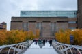 View of the Tate Modern art gallery in converted power station, South Bank, London. Taken from the Millennium Bridge in autumn