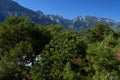 View of the Taurus Mountains, Mediterranean pines and the sea coast from the hotel. Rest in hotels of Turkey. Summer rest Royalty Free Stock Photo