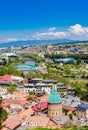 View of Tbilisi city from Sololaki Hill, old town and modern architecture. Bridge of Peace Presidential and Concert Music