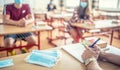 View from the teachers desk of students wearing protective masks against coronavirus disease