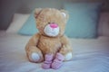 View of teddy bear and baby socks Royalty Free Stock Photo