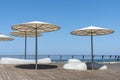 View of Tel Aviv Beach Promenade, Israel. Sunshades at sunset at Tel Aviv Royalty Free Stock Photo