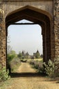 View of a temple through old gate of a fort