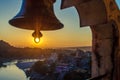 View from the temple under huge bell on River Ganga and Lakshman Jhula bridge at sunset. Rishikesh.