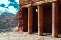 View of the Temples carved into the sandstone rock in the gorge. Petra, Jordan. Royalty Free Stock Photo