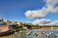 View of Tenby harbour against a blue summer sky.