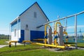 View of territory of gas distribution station from outside on sunny summer day. Industrial building. New gas supply Royalty Free Stock Photo