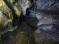 View and texture of the inner walls of a mountain cave with stalactites and stalagmites in the Dirfys mountains on the Greek islan