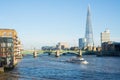 View of the Thames and Southwark bridge with a ferry