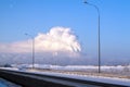 View of the thermal power plants from the highway. Pipes of thermal power plants emit thick smoke. Thermal power plants in thick Royalty Free Stock Photo