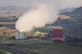 View of thermoelectric geothermal power and heating plant close to Krafla, Iceland with visible pipes, scenery, lake, tower, Royalty Free Stock Photo