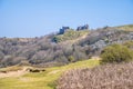 A view from Three Cliffs Bay towards the ruins of Pennard Castle, Gower Peninsula, Swansea, South Wales Royalty Free Stock Photo