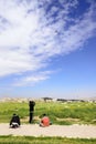 View of three jordanian boys playing with kite in Amman Citadel, Jordan Royalty Free Stock Photo