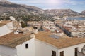 View of the tiled roofs of the village of Altea, overlooking the sea and the mountain range, province of Alicante, Spain Royalty Free Stock Photo