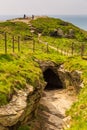 View of Tintagel Island and legendary Tintagel castle. Royalty Free Stock Photo