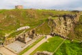 View of Tintagel Island and legendary Tintagel castle. Royalty Free Stock Photo