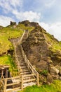 View of Tintagel Island and legendary Tintagel castle. Royalty Free Stock Photo