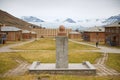 View to abandoned Russian arctic settlement Pyramiden with the bust of Lenin in the foreground in Pyramiden, Norway.