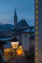 view to alleyway and church at old town salzburg, festive lantern Royalty Free Stock Photo