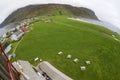 View to the Alnes town and sea coast from the old lighthouse filmed with fish-eye lens in Alnes, Norway. Royalty Free Stock Photo