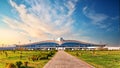 View to Ashgabat International Airport, formerly known as Saparmurat Turkmenbashy International Airport in sunset light. Located Royalty Free Stock Photo