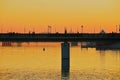 View to the Astana city and pedestrian bridge over the Ishim river at dusk in Astana, Kazakhstan. Royalty Free Stock Photo