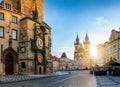 View to the astronomical clock and the old town square of Prague during sunrise