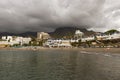 View to the beach with natural dark sand. Royalty Free Stock Photo