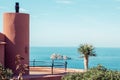 View to Benidorm Island in Mediterranean Sea from the coast. Architectural detail of modern mediterranean house with Royalty Free Stock Photo