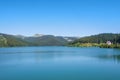 A view to Bolboci lake from the damb with carpathian mountains a