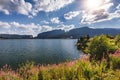 View to Bolboci lake and the damb with carpathian mountains at t