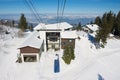 View to the cable car station at the slope of the Pilatus mountain from the cable car gondola in Lucern, Switzerland.