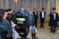 View to the camera display recording Jewish chasid wedding