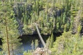 View to the canyon lake Julma-Olkky and wooden bridge over the lake, Hossa National Park