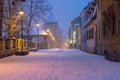 View to the Cetatii street in the historical center of Sibiu on a winter evening in Transylvania Region, Romania