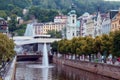 A view to the city center with river and splashing fountain at spa Karlovy Vary Royalty Free Stock Photo