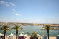 View to the coastline with waterfront - beach promenade and marina of Lagos, Algarve