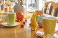 View to a colorful easygoing family breakfast table decorated for Easter